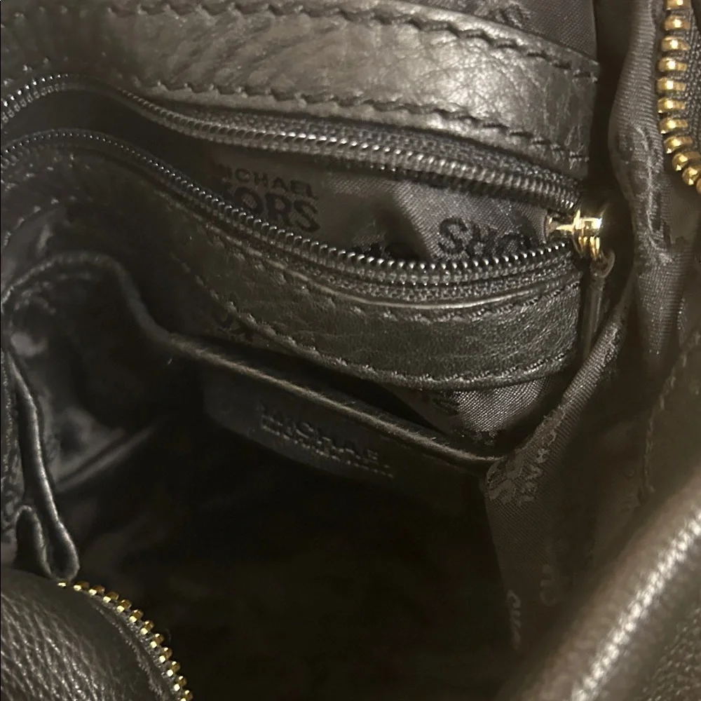 Michael Kors Black Hobo Bag with Gold Accents